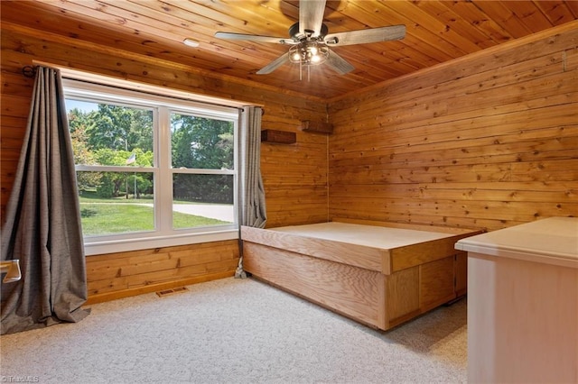 4962 Serenity Ln, Granite Falls, NC 28630 - unfurnished bedroom with light carpet, wooden walls, wooden ceiling, and ceiling fan