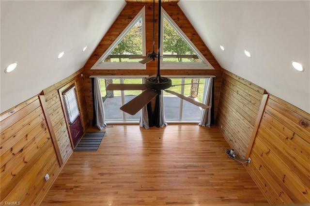 4962 Serenity Ln, Granite Falls, NC 28630 - unfurnished living room featuring wood walls, light wood finished floors, recessed lighting, and high vaulted ceiling