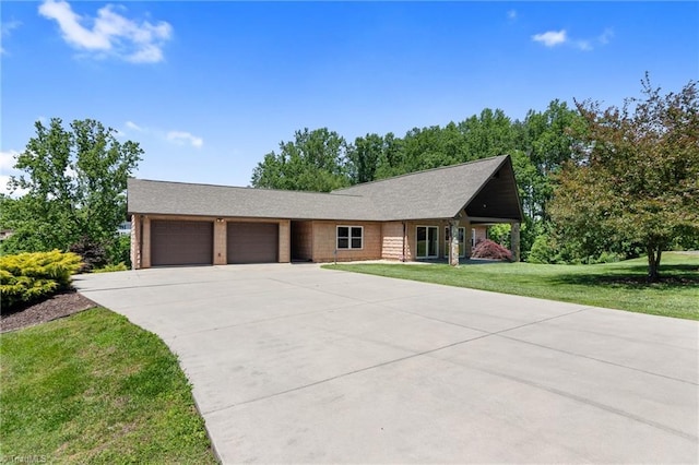 4962 Serenity Ln, Granite Falls, NC 28630 - ranch-style home with a garage, a front lawn, and concrete driveway