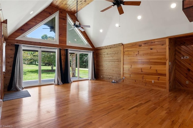 4962 Serenity Ln, Granite Falls, NC 28630 - unfurnished living room featuring ceiling fan, wood walls, high vaulted ceiling, recessed lighting, and wood finished floors