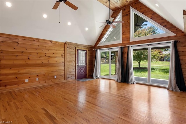 4962 Serenity Ln, Granite Falls, NC 28630 - unfurnished living room featuring a ceiling fan, wooden walls, high vaulted ceiling, wood finished floors, and recessed lighting
