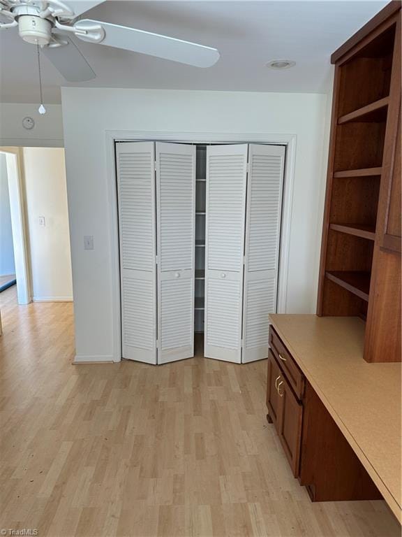 135 Plantation Place Ln, Mount Airy, NC 27030 - unfurnished bedroom with a closet, light wood-style flooring, and ceiling fan