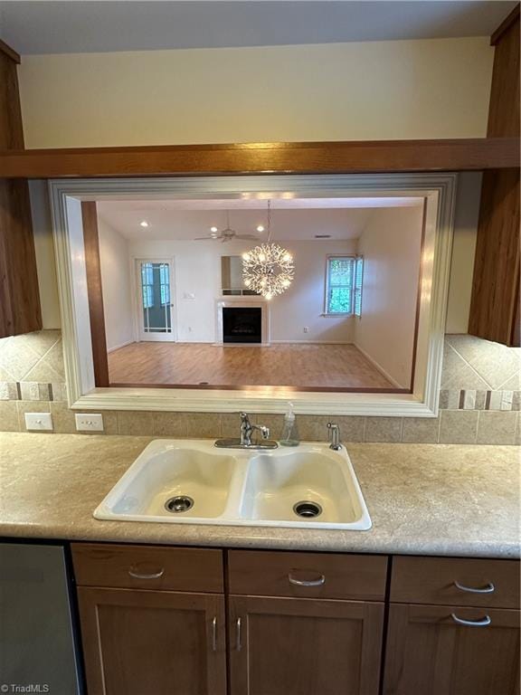 135 Plantation Place Ln, Mount Airy, NC 27030 - kitchen with light countertops, backsplash, and stainless steel dishwasher
