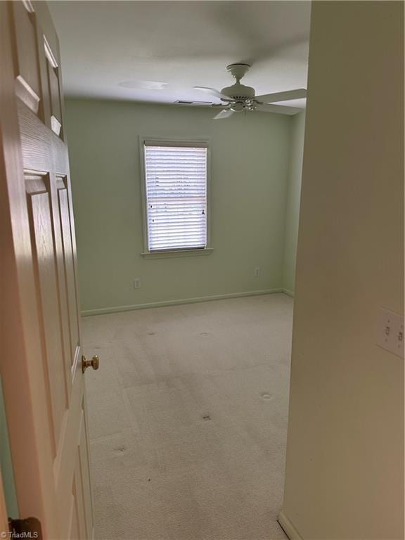 135 Plantation Place Ln, Mount Airy, NC 27030 - spare room with a ceiling fan and light carpet