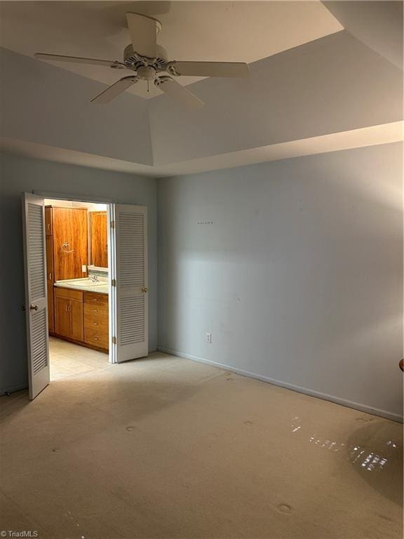 135 Plantation Place Ln, Mount Airy, NC 27030 - unfurnished bedroom with light carpet, ensuite bathroom, lofted ceiling, and a ceiling fan