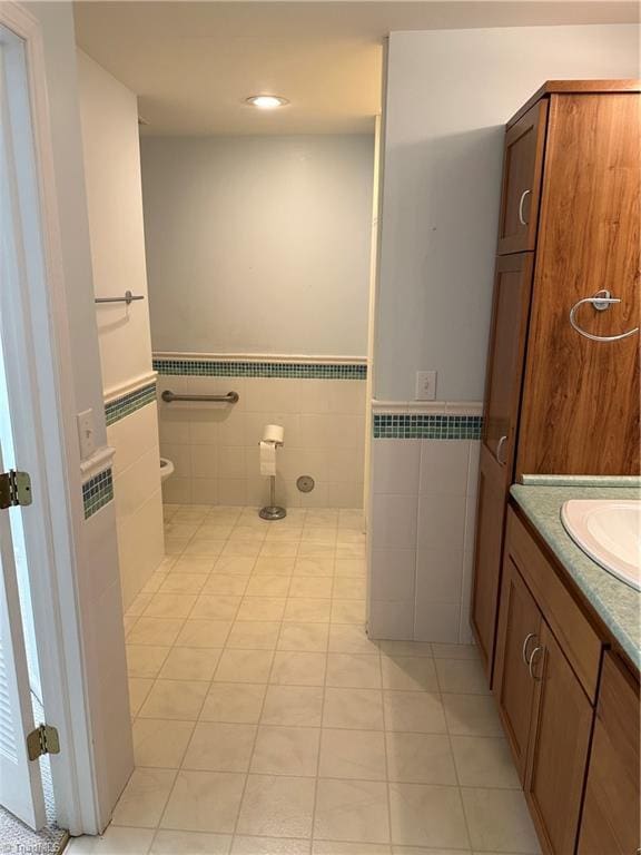 135 Plantation Place Ln, Mount Airy, NC 27030 - bathroom with tile walls, vanity, tile patterned flooring, a wainscoted wall, and recessed lighting