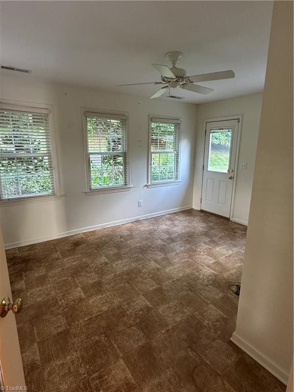 135 Plantation Place Ln, Mount Airy, NC 27030 - empty room featuring baseboards and a ceiling fan