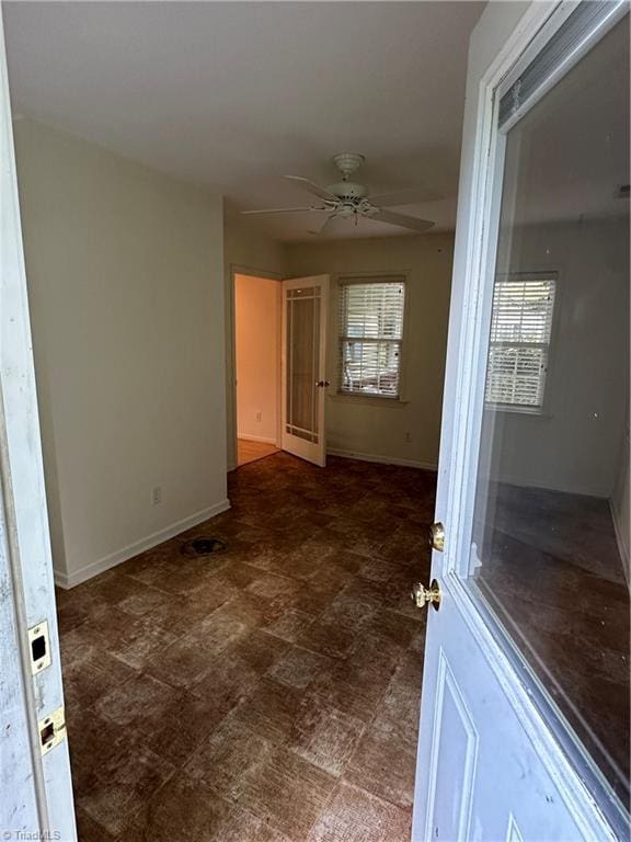 135 Plantation Place Ln, Mount Airy, NC 27030 - empty room with a ceiling fan and plenty of natural light