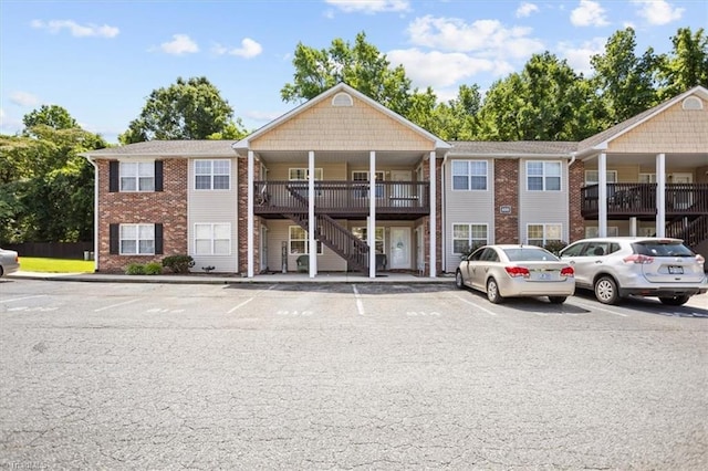 816 W Brook Ct, Archdale, NC 27263 - view of property with uncovered parking and stairs