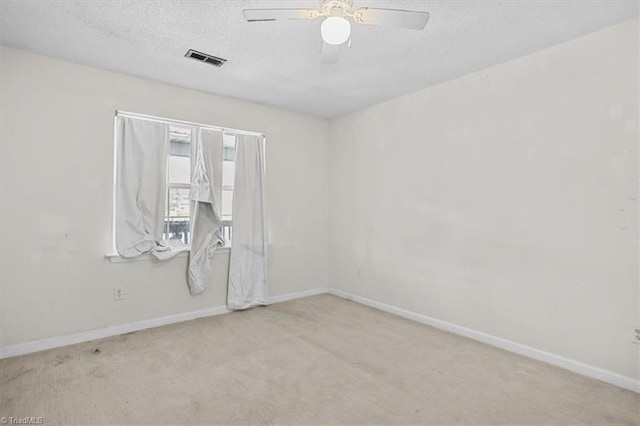 816 W Brook Ct, Archdale, NC 27263 - spare room featuring a textured ceiling, carpet flooring, and a ceiling fan