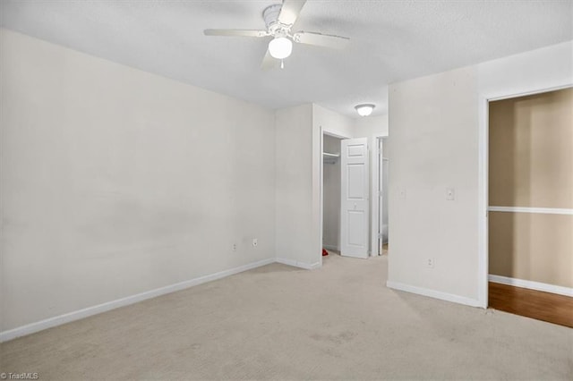 816 W Brook Ct, Archdale, NC 27263 - unfurnished bedroom with light colored carpet, a closet, ceiling fan, and a textured ceiling