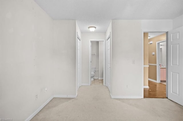 816 W Brook Ct, Archdale, NC 27263 - unfurnished bedroom with light colored carpet and a textured ceiling