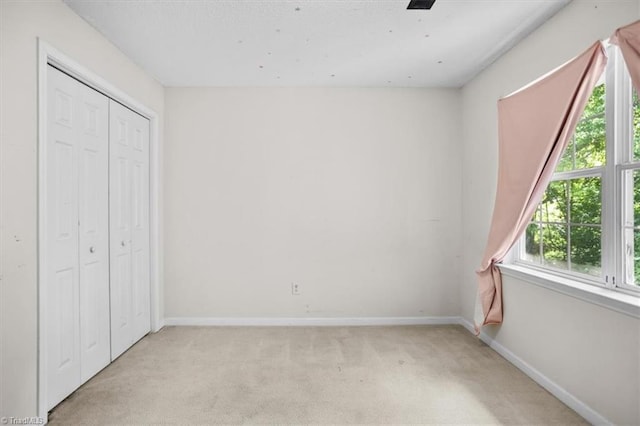 816 W Brook Ct, Archdale, NC 27263 - unfurnished bedroom featuring light colored carpet and a closet