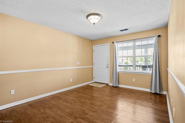 816 W Brook Ct, Archdale, NC 27263 - unfurnished room featuring wood finished floors and a textured ceiling