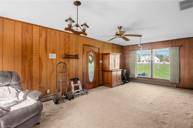 520 S Bunker Hill Rd, Colfax, NC 27235 - sitting room featuring carpet, wooden walls, and ceiling fan