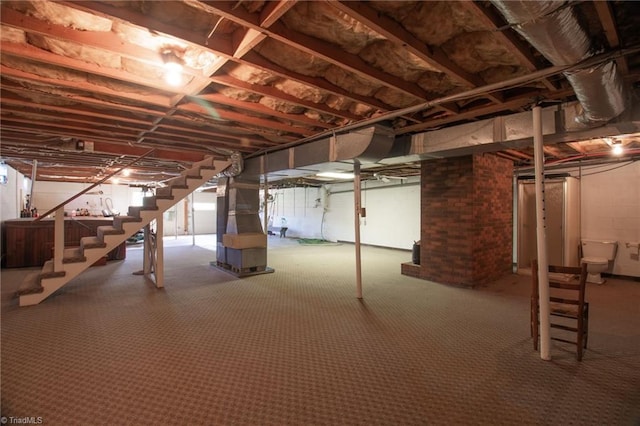 520 S Bunker Hill Rd, Colfax, NC 27235 - unfinished basement featuring stairs and carpet floors