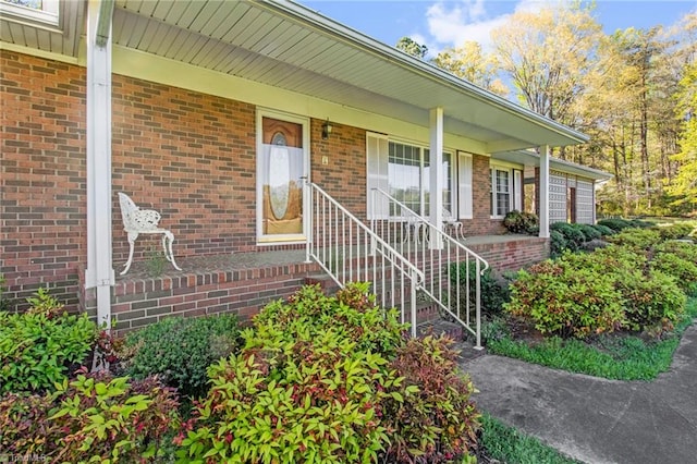 520 S Bunker Hill Rd, Colfax, NC 27235 - property entrance with covered porch and brick siding