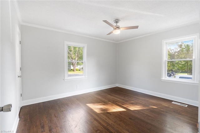 1908 Hilldale Dr, Burlington, NC 27215 - unfurnished room featuring dark wood-style flooring, a ceiling fan, and ornamental molding