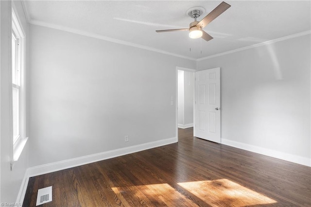 1908 Hilldale Dr, Burlington, NC 27215 - empty room featuring ceiling fan, dark wood finished floors, and crown molding