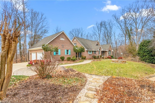 view of front of home with a garage and a front yard