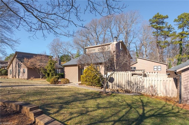 exterior space featuring a front lawn