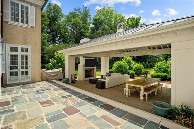 view of patio featuring an outdoor hangout area and a gazebo