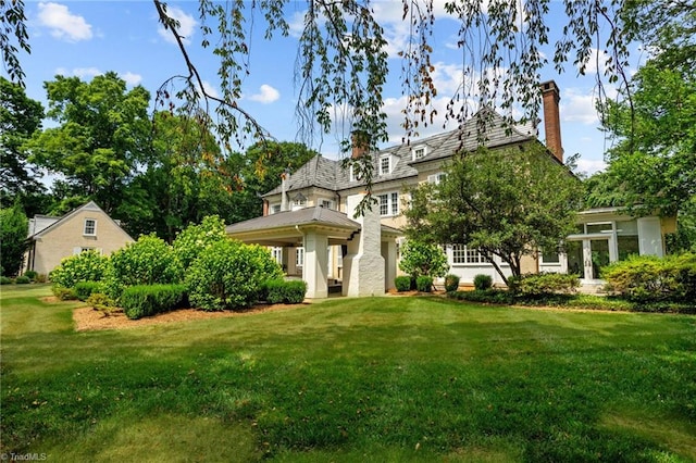 view of front of home with a front yard