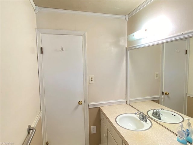 bathroom featuring vanity and ornamental molding