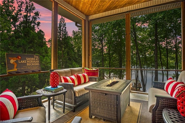 sunroom with wood ceiling