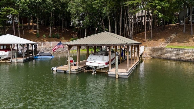 dock area featuring a water view