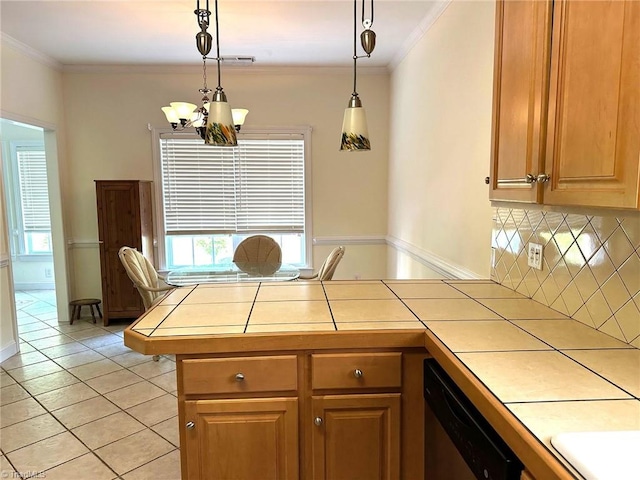 kitchen featuring tasteful backsplash, stainless steel dishwasher, a peninsula, a chandelier, and tile counters