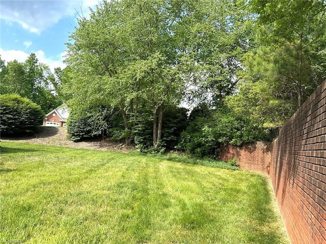 view of yard with fence
