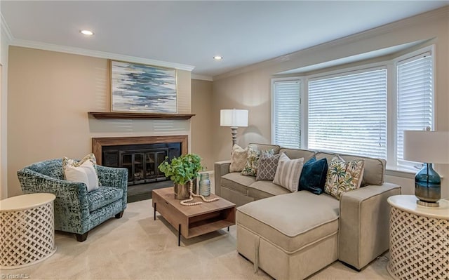 living room featuring crown molding, plenty of natural light, a glass covered fireplace, recessed lighting, and light carpet