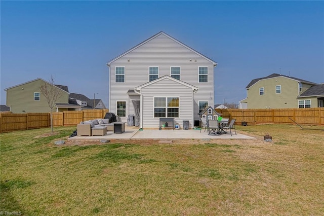 back of house with a lawn, a patio area, a fenced backyard, and an outdoor living space