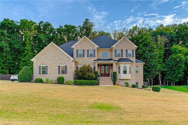 view of front of property with a front lawn