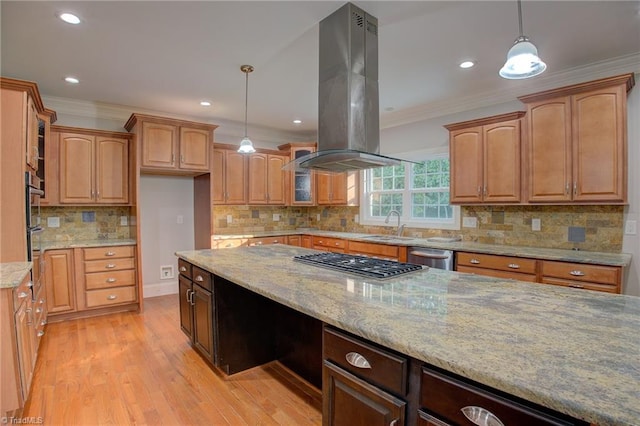 kitchen with decorative backsplash, light stone counters, light hardwood / wood-style floors, and island exhaust hood