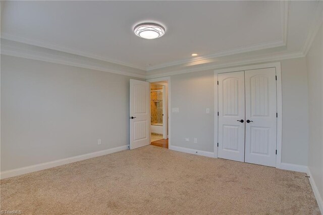 bathroom featuring vanity, tile patterned floors, and crown molding