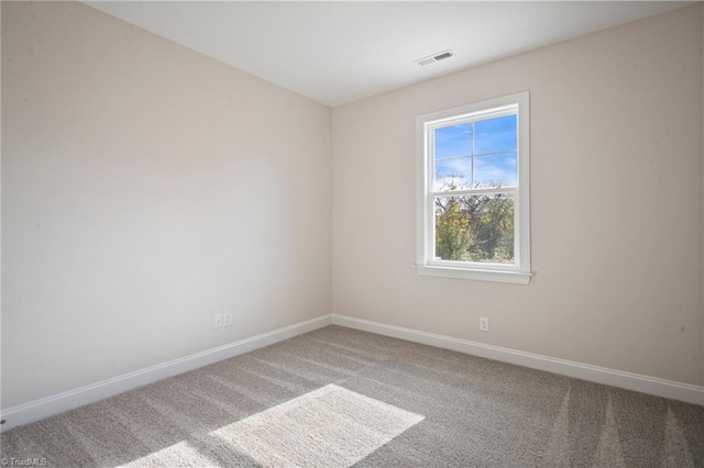 empty room with carpet floors