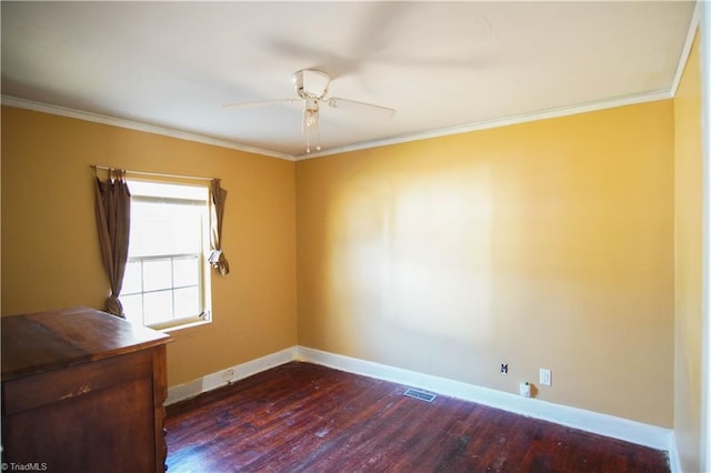 unfurnished room featuring dark hardwood / wood-style flooring, ornamental molding, and ceiling fan