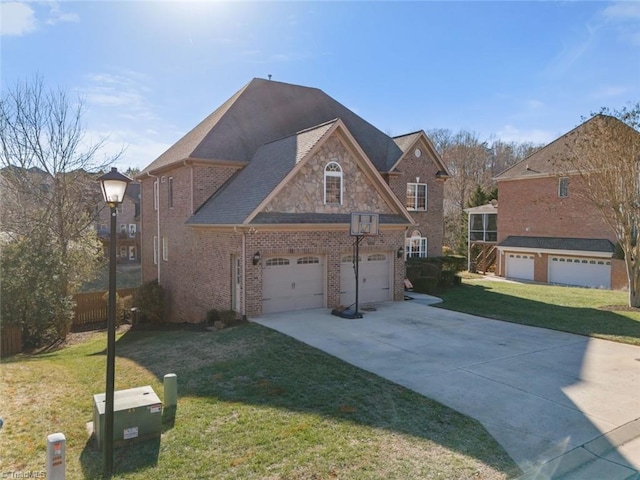 view of front of house featuring a garage and a front yard