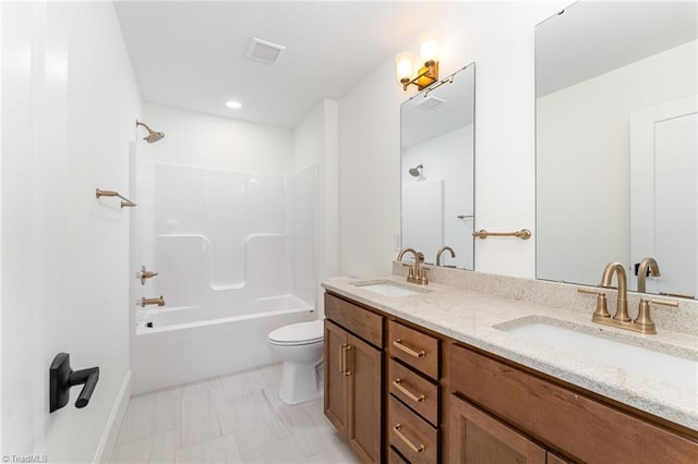 full bathroom with toilet, shower / bathing tub combination, and vanity