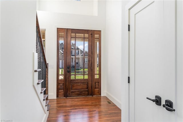 foyer featuring dark hardwood / wood-style floors