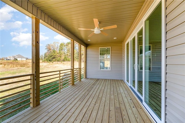 wooden terrace with ceiling fan