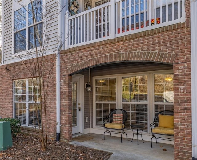 doorway to property featuring a balcony