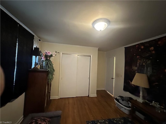 735 Fairfield St, Burlington, NC 27215 - bedroom with wood finished floors, a closet, and baseboards