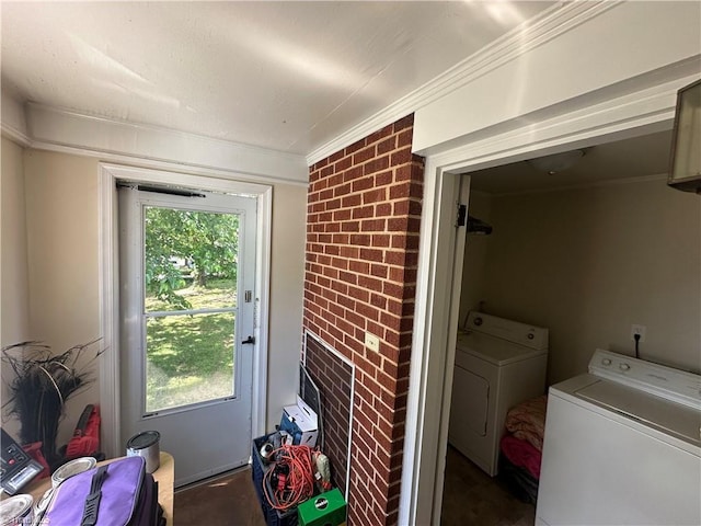 735 Fairfield St, Burlington, NC 27215 - clothes washing area with washer and clothes dryer, crown molding, and brick wall
