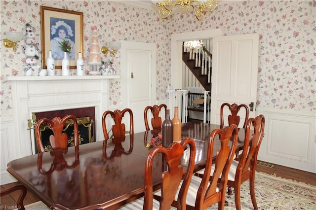 dining area with hardwood / wood-style flooring