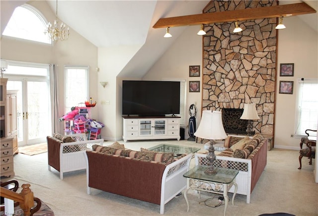 living room with a fireplace, an inviting chandelier, beamed ceiling, and high vaulted ceiling