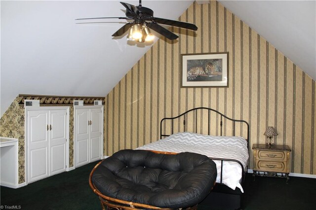 bedroom featuring ceiling fan, lofted ceiling, and dark colored carpet