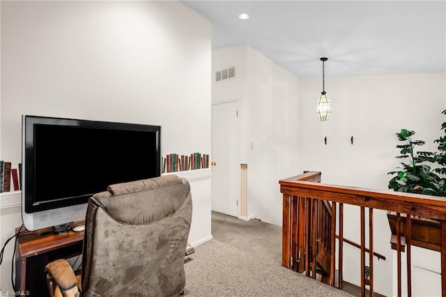 carpeted office with visible vents and recessed lighting
